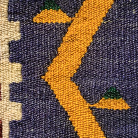 Close-up of a flat woven rug surface